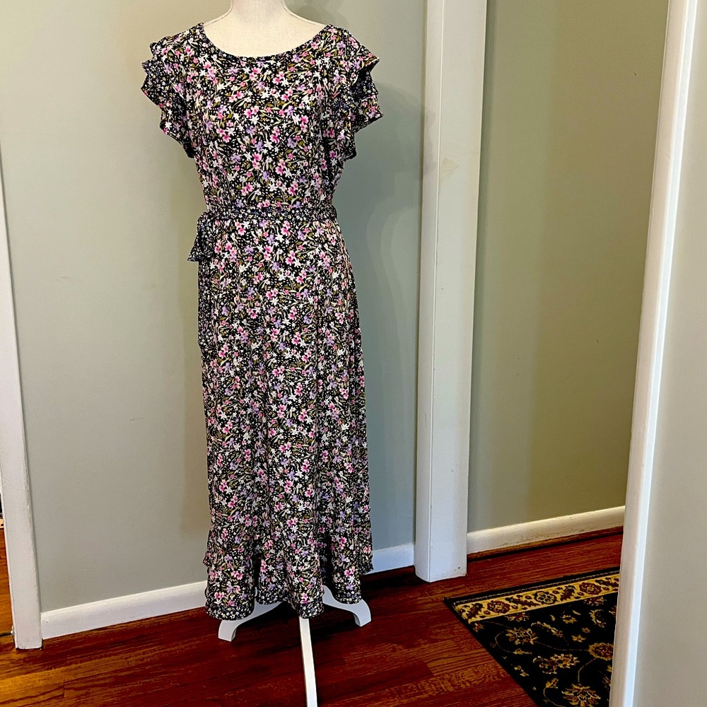 Stunning jersey short ruffled bell sleeved dress.